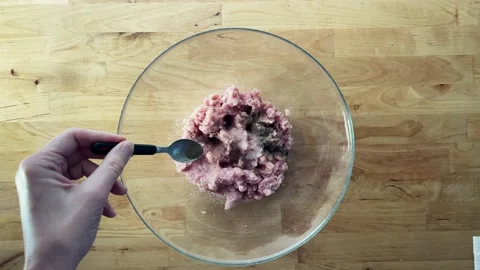 Stir the minced spices with your hands. Top view cooking houses Stock Footage 228433218