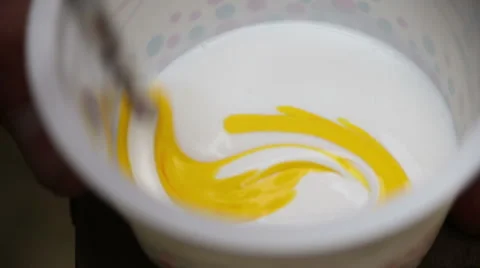 Stir the paint in jar Stock Footage 63823703