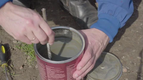 Stir The Paint In Jar Stock Footage 254568922