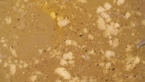 Stir of saturated broth for making aspic closeup. side view. selective focus. Stock Footage 240809078
