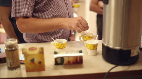 Stir the sugar in the coffee cup Stock Footage 67352377