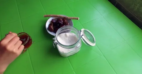 Stir sugar in tea, drink tea. Stock Footage 76788692