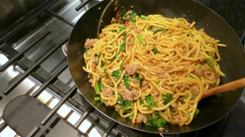 Stirfry noodle being cooked Stock Footage 173503622