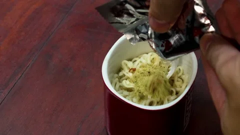 Stiring noodle in the mug Stock Footage 204544000