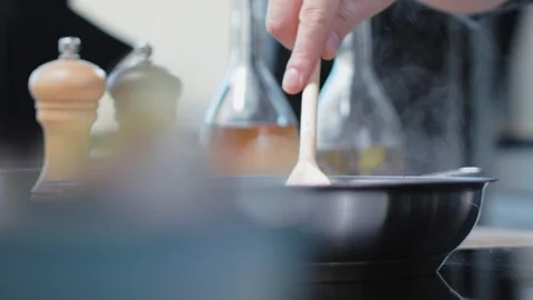 Stiring A Pan In The Kitchen Stock Footage 93063767