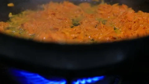 Stirred in pan roasted carrot and onion Stock Footage 70684368