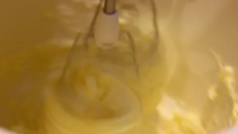 Stirring and composing cake cream in a mixer. Video stock 168308782