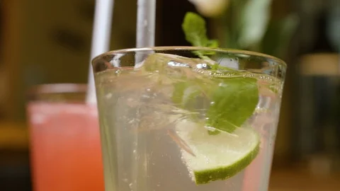 Stirring Around Lemonade with Straw Vídeo Stock 111768800