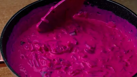 Stirring the beet borscht Stock Footage 320248780