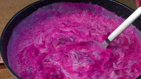 Stirring the beet borscht Stock Footage 320248787