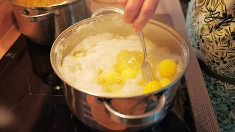 Stirring Boiling Potatoes in Stainless Pot During Home Cooking Process Stock Footage 338430796