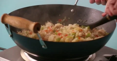 Stirring broth, vegetable mixture, chicken, and rice 2 스톡 동영상 132199386