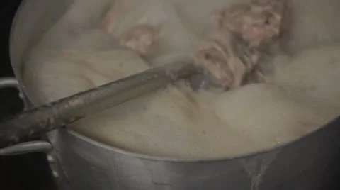 Stirring bubbling broth Stock Footage 42429160