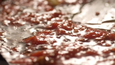 Stirring Bubbling tomato sauce close-up. Stock Footage 263759002