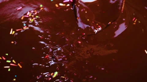 Stirring Chocolate with Sprinkles 库存影片 308502483