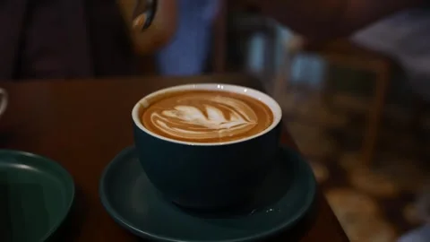 Stirring Coffee in a Cafe, Close Up 4K Video stock 342936993