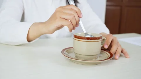 Stirring Coffee in a Cup With a Spoon 스톡 동영상 347626462