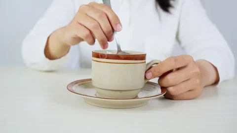 Stirring Coffee in a Cup With a Spoon 스톡 동영상 347626464