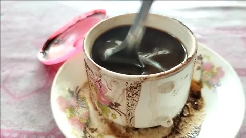 Stirring the coffee Stock Footage 234240064