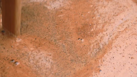 Stirring Coffee Grounds shot through a prism Stock Footage 91505745