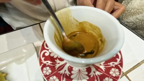 Stirring Coffee in Paris Cafe Stock Footage 304027070