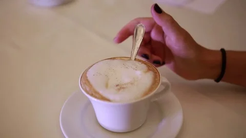Stirring a Cup of coffee Video stock 74532633