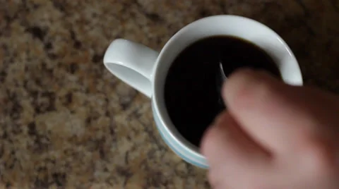 Stirring a cup of tea 動画素材 36032445