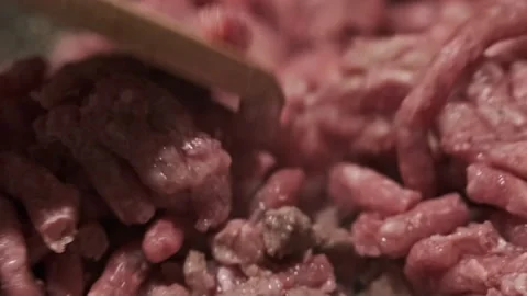 Stirring Delicious Red Minced Beef Meat with Wooden Spoon. Food Concept Stock Footage 145748619