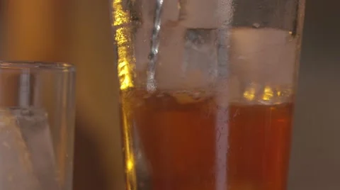 Stirring a drink in slow motion Stock Footage 65042200