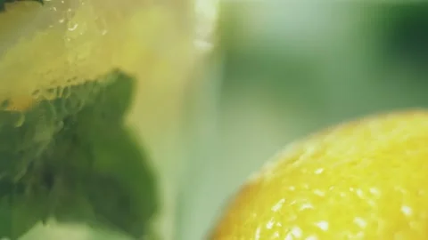 Stirring fresh cold lemonade with a spoon. Stock Footage 138565712