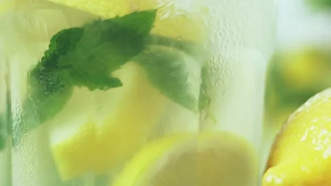 Stirring fresh cold lemonade with a spoon. Stock Footage 138566452