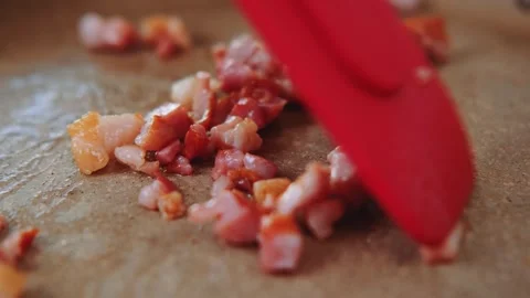 Stirring fried bacon in a skillet Stock-Footage 252201296
