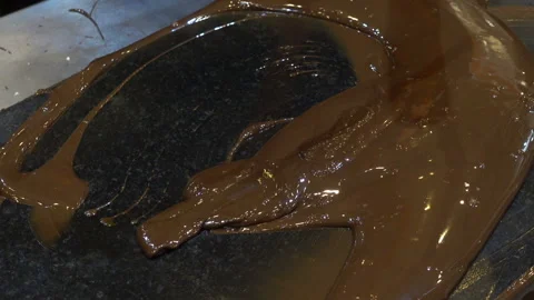 Stirring hot chocolate with spatulas. Stock Footage 101870156
