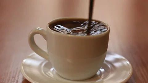 Stirring hot coffee Stock Footage 34548134