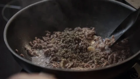 Stirring meat closeup Stock Footage 97411101