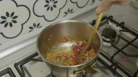 Stirring minced meat, vegetables and tomato paste in cooking pot. Stock-Footage 153458692
