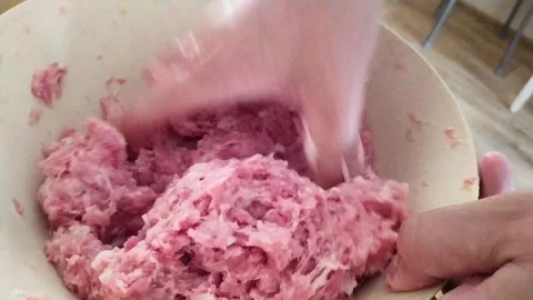 Stirring minced pork meat. Stock Footage 130587489