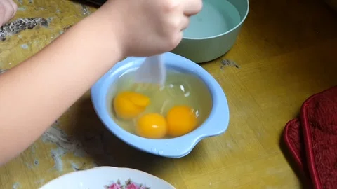 Stirring to mixed egg or beaten egg or whisked egg for cooking scramble egg.. Stock Footage 279294530