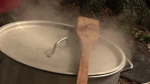 Stirring paddle on top of crawfish boiling pot Stock Footage 37720375