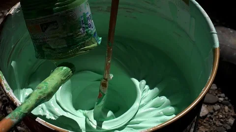 Stirring paint in slow motion Stock Footage 107401904