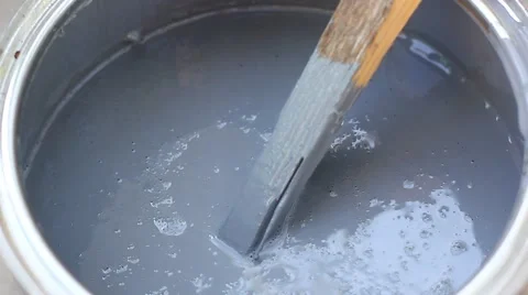 Stirring the paint with a stick Vídeo Stock 52731945