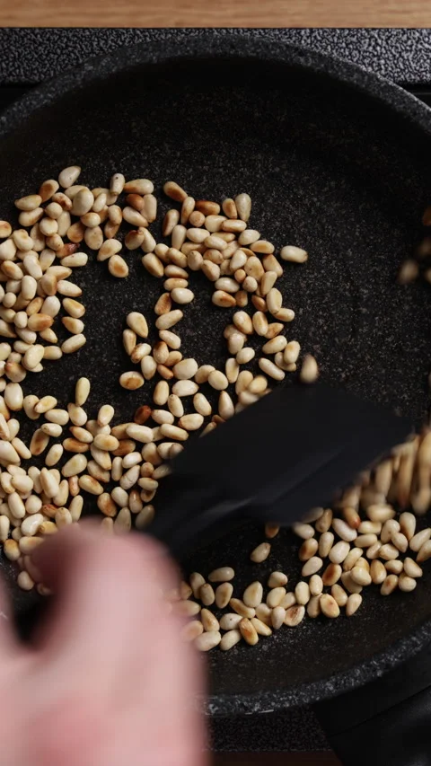Stirring Pine Nuts Close Up Top View Vertical Vidéo 337190788