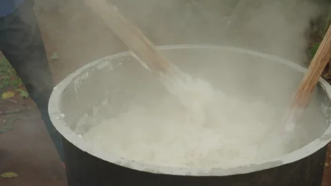 Stirring Posho in Uganda Stock Footage 247679526