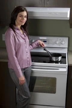 Stirring the pot Stock-Fotos