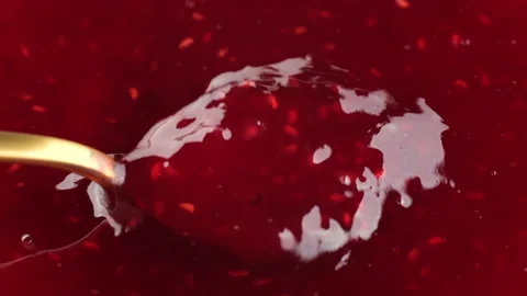 Stirring raspberry jam with wooden, top view Stock Footage 252264629