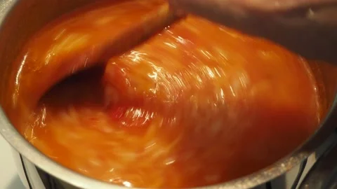 Stirring the rice tomato soup Stock Footage 141467928
