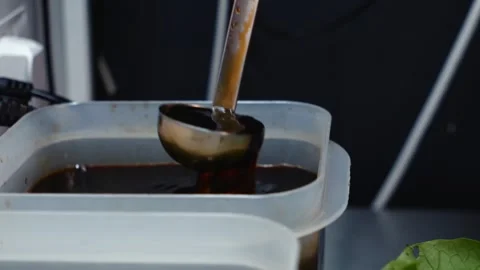 Stirring Sauce with Ladle Stock Footage 340026803