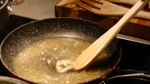 Stirring Sauce to make a soup Stock Footage 93690532