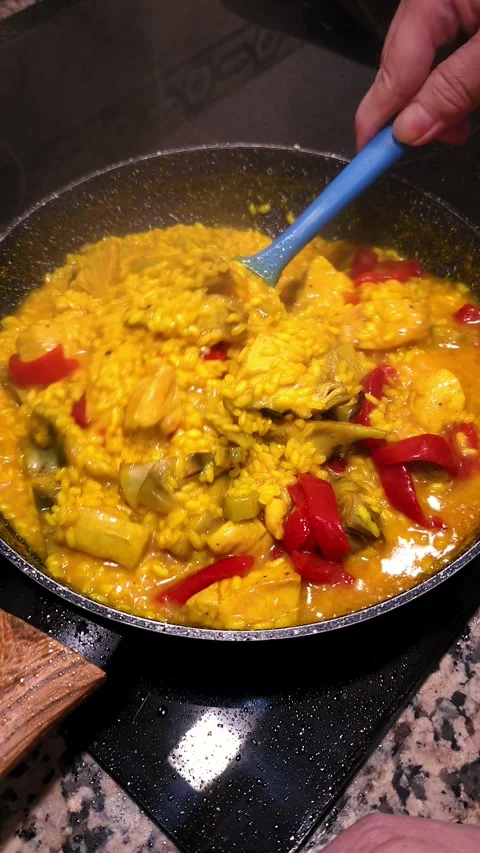 Stirring spanish paella. Stock Footage 344967681