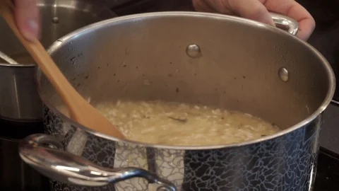 Stirring stewing rice Stock Footage 112127084